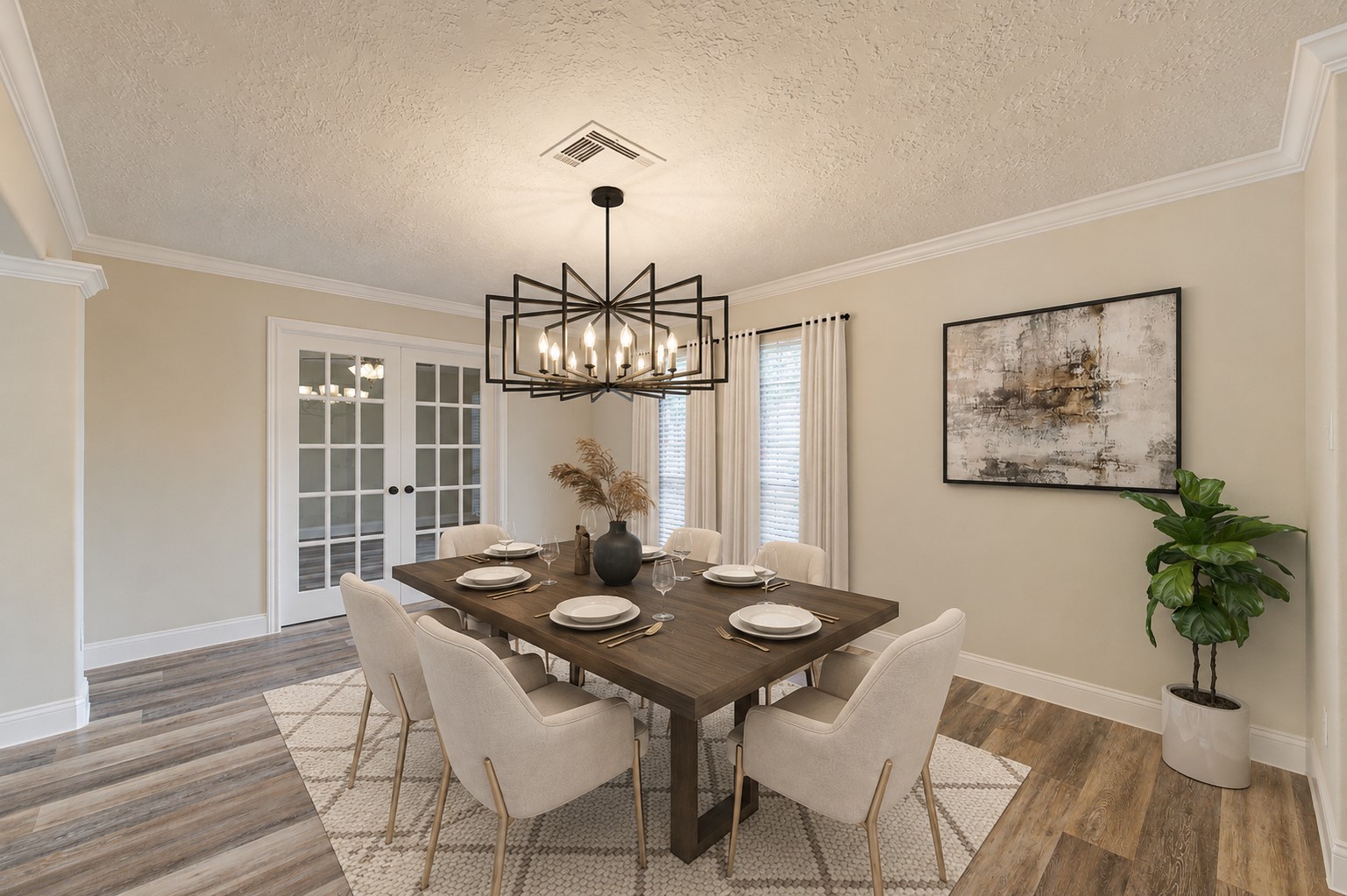 9115 Taidswood Drive Spring, TX 77379 - Photo 6 of 45 The formal dining room displays a chic and stylish new chandelier, all new flooring, crown molding, tall baseboards, and window blinds. Beyond the French door is a private home office/study.