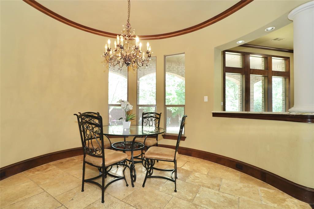 1609 Singletree Court McKinney, TX 75072 - Photo 14 of 38 a dining room with furniture and window