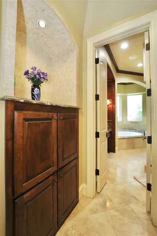 1609 Singletree Court McKinney, TX 75072 - Photo 17 of 38 a view of a hallway with wooden floor