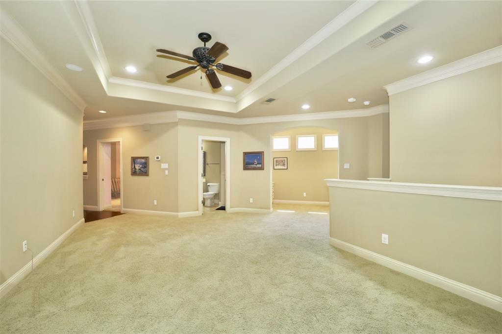 1609 Singletree Court McKinney, TX 75072 - Photo 24 of 38 a view of a livingroom with a ceiling fan