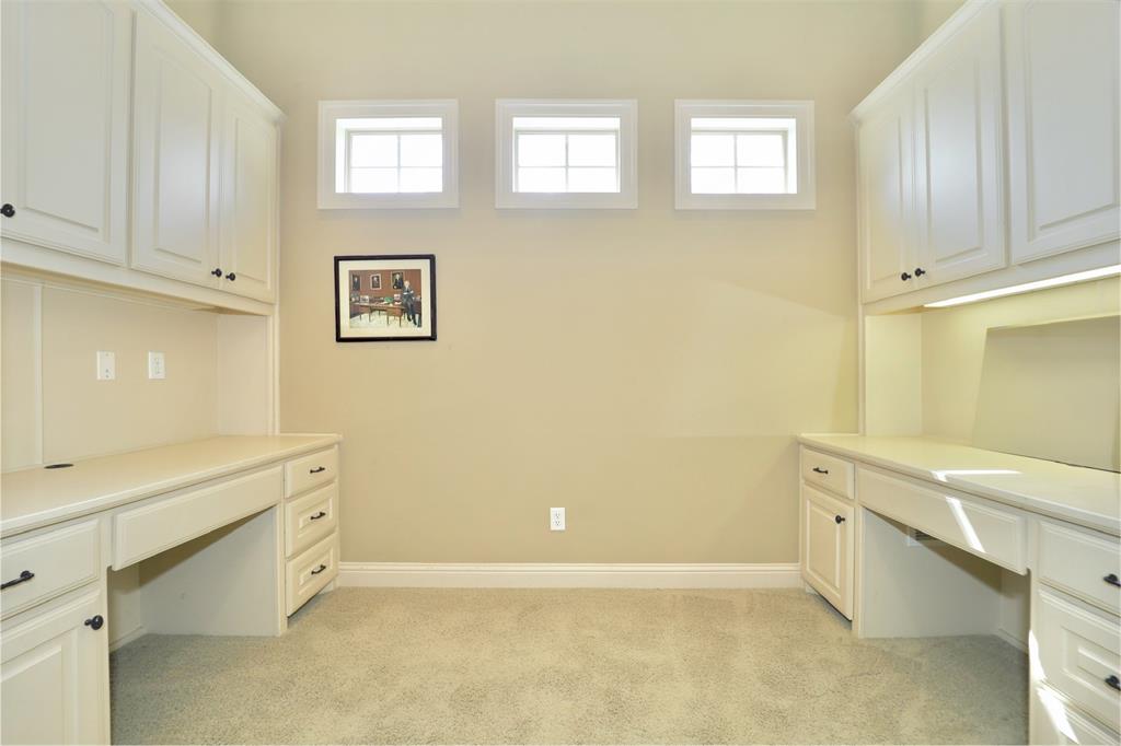 1609 Singletree Court McKinney, TX 75072 - Photo 25 of 38 a view of cabinets and window