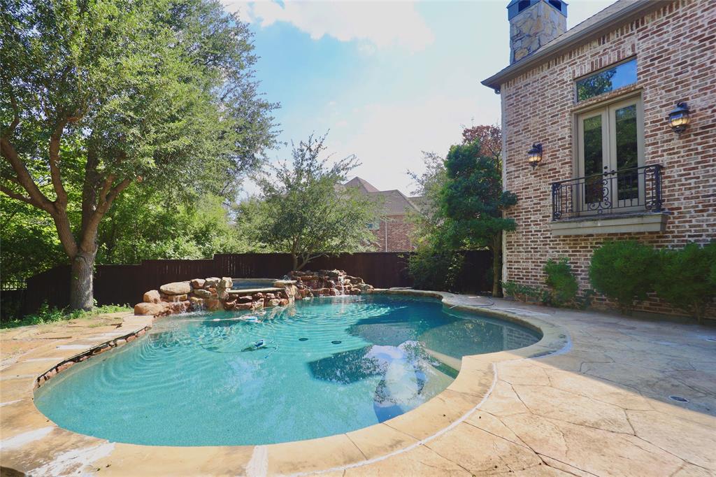1609 Singletree Court McKinney, TX 75072 - Photo 35 of 38 a view of a swimming pool with a sitting area