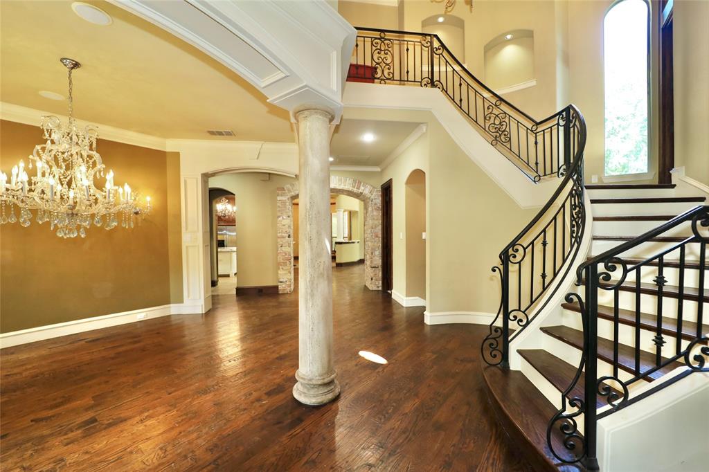 1609 Singletree Court McKinney, TX 75072 - Photo 5 of 38 a view of entryway and hall with wooden floor