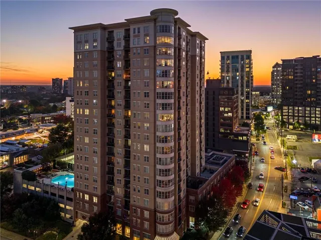 a view of a city with tall buildings