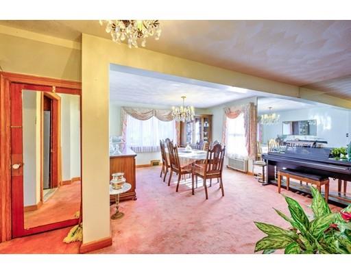 31 Kilburn Road Newton, MA 02465 - Photo 12 of 29 a dining room with furniture and a floor to ceiling window