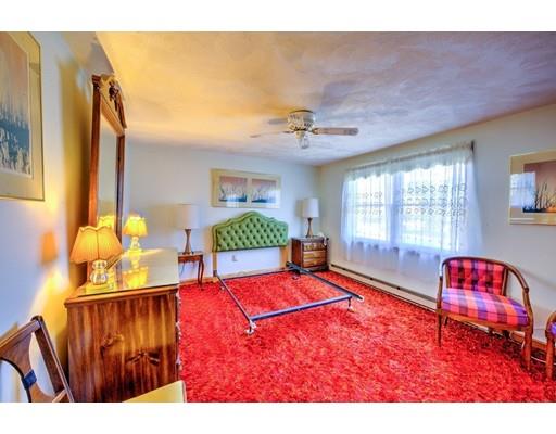 31 Kilburn Road Newton, MA 02465 - Photo 17 of 29 a living room with furniture pool table and painting on the wall