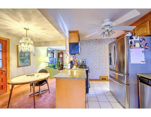 31 Kilburn Road Newton, MA 02465 - Photo 7 of 29 a kitchen with a table and chairs