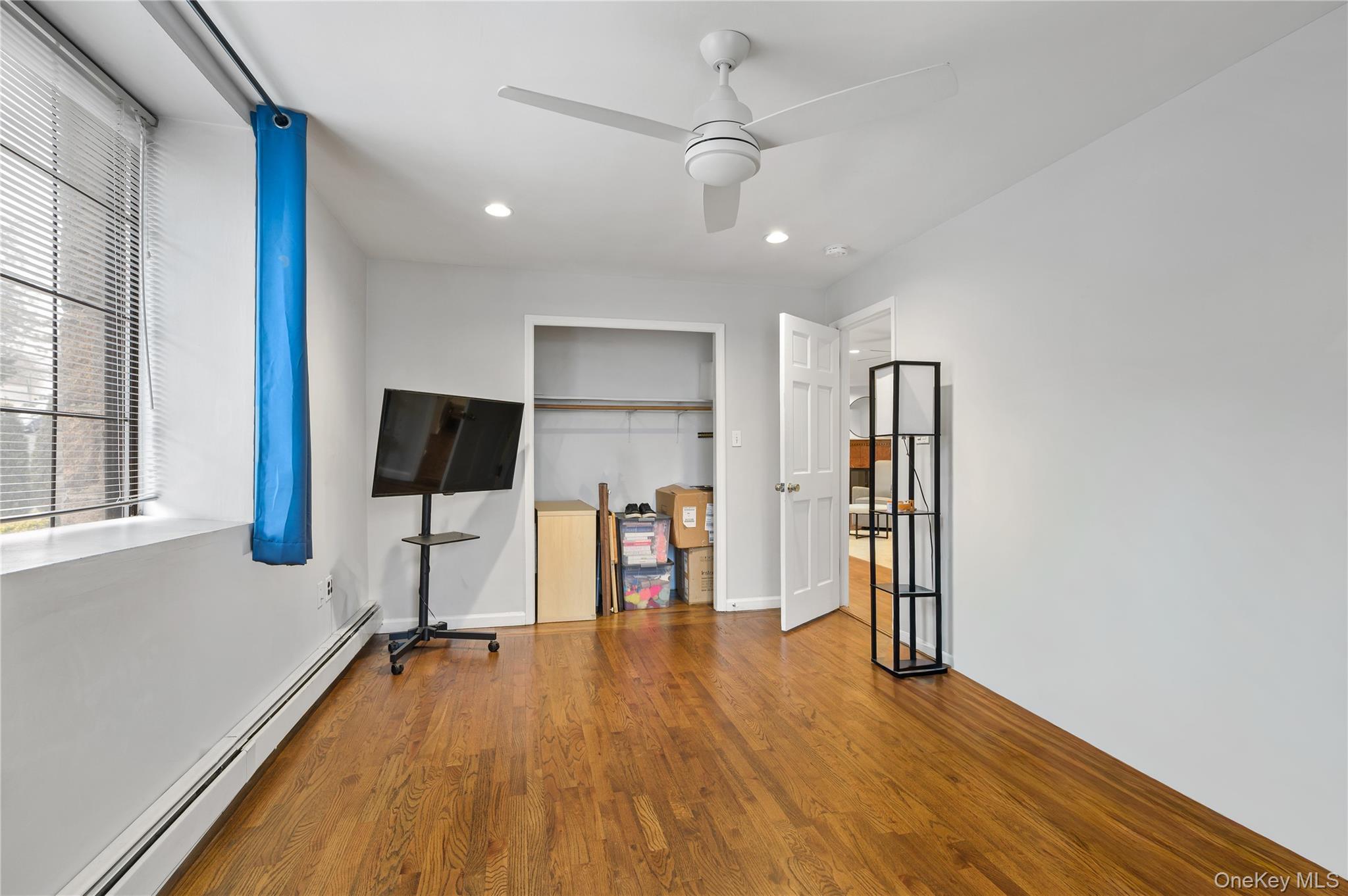 914 Wynnewood Road, Unit LL4 Pelham, NY 10803 - Photo 15 of 22 a view of a room with gym equipment and a flat screen tv