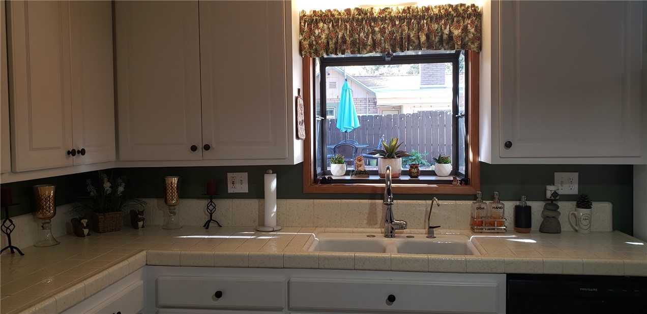 965 Snowbird Road Wrightwood, CA 92397 - Photo 11 of 28 a kitchen with a sink and cabinets
