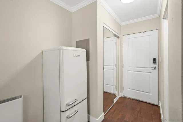 a view of a storage & utility room with a washer dryer