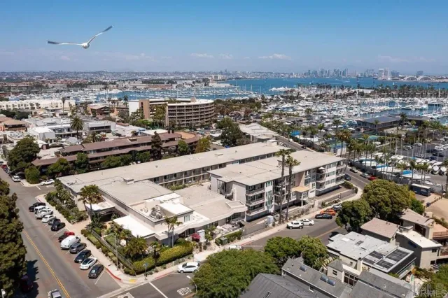 an aerial view of a house with a city view