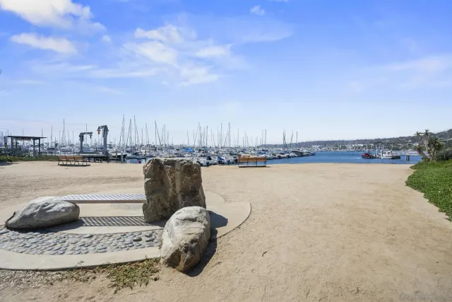 a view of a lake with a nearby beach