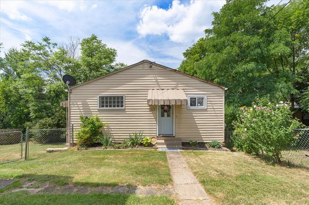553 Fairoaks Street McKees Rocks, PA 15136 - Photo 1 of 22 a front view of a house with a yard