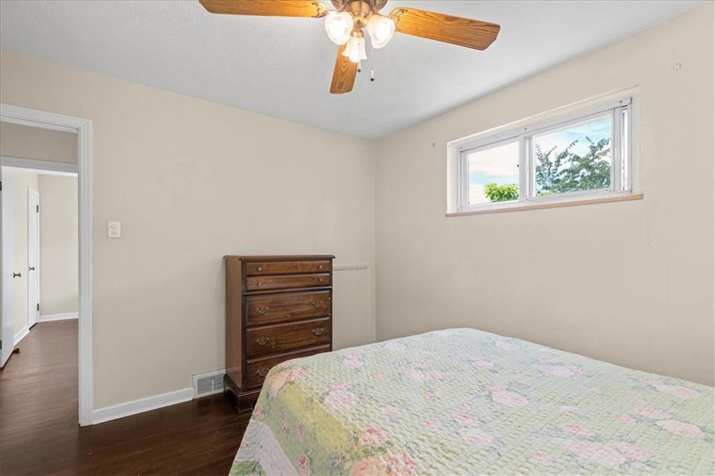 553 Fairoaks Street McKees Rocks, PA 15136 - Photo 9 of 22 a bedroom with a bed and a dresser