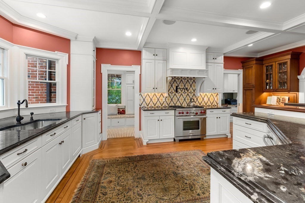 37 Colbourne Crescent Brookline, MA 02445 - Photo 13 of 29 a kitchen with stainless steel appliances granite countertop a stove and a sink