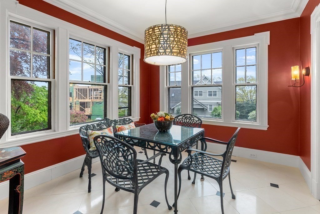 37 Colbourne Crescent Brookline, MA 02445 - Photo 14 of 29 a dining room with furniture a chandelier and wooden floor