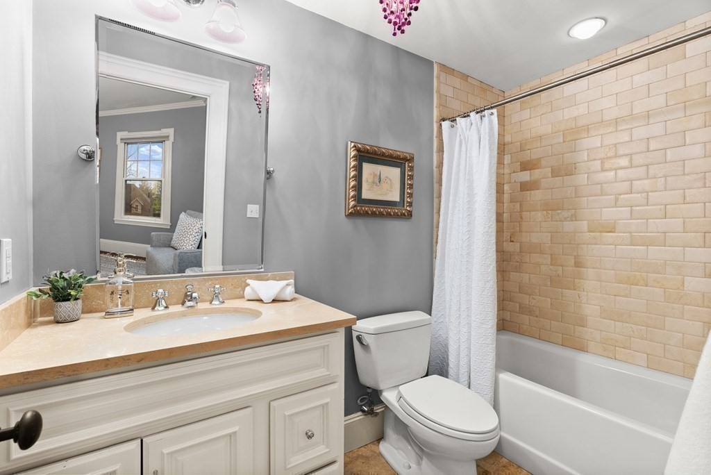 37 Colbourne Crescent Brookline, MA 02445 - Photo 16 of 29 a bathroom with a sink a toilet and shower