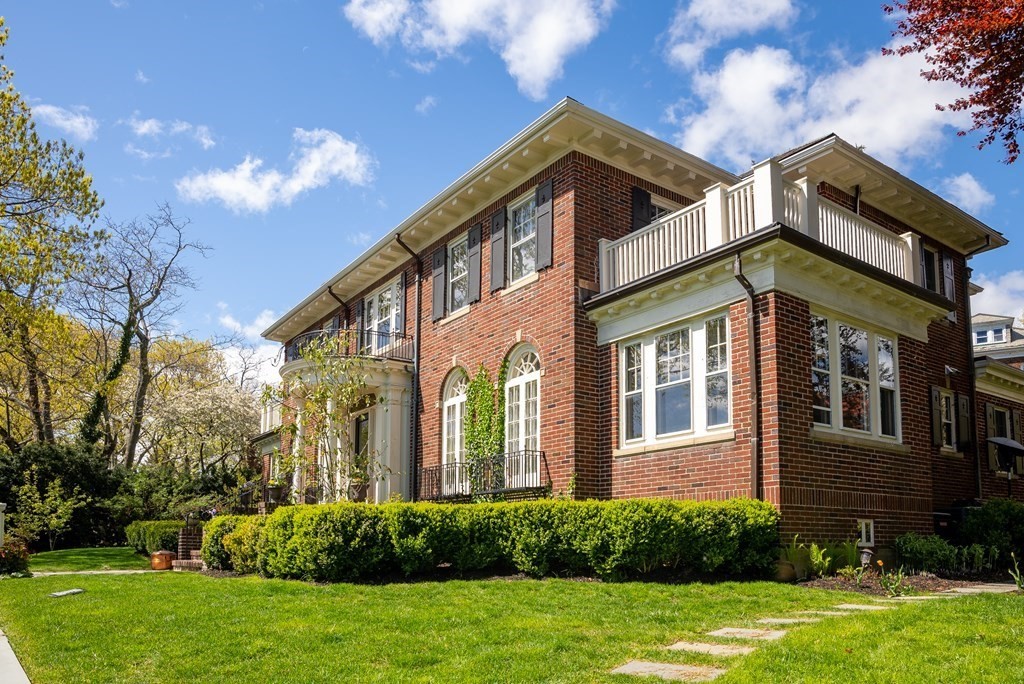 37 Colbourne Crescent Brookline, MA 02445 - Photo 3 of 29 a view of a house with brick walls and a yard with plants