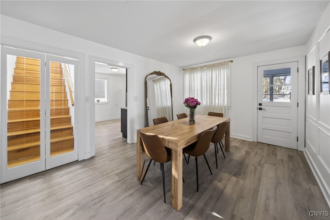 1315 Cold Springs Road Salina, NY 13090 - Photo 11 of 46 Access the sunroom to the side, kitchen, and behin