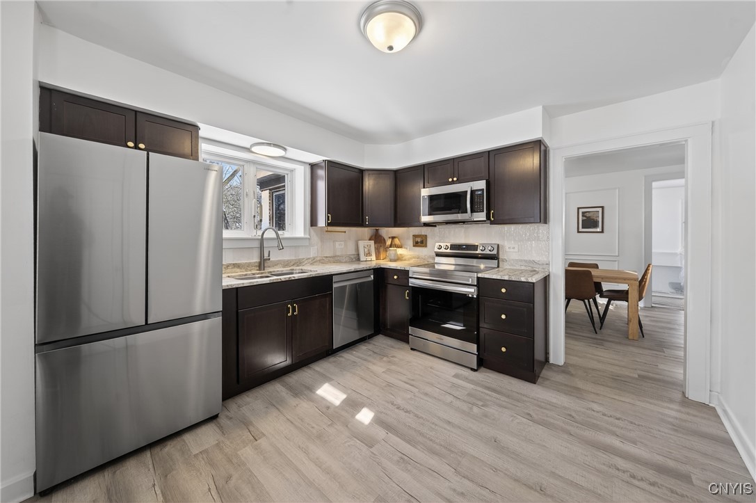 1315 Cold Springs Road Salina, NY 13090 - Photo 15 of 46 The inviting kitchen is perfect! Freshly painted