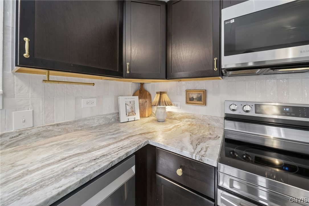 1315 Cold Springs Road Salina, NY 13090 - Photo 17 of 46 New backsplash is beautiful, but simple enough to