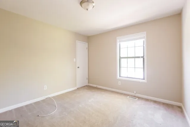 an empty room with a window