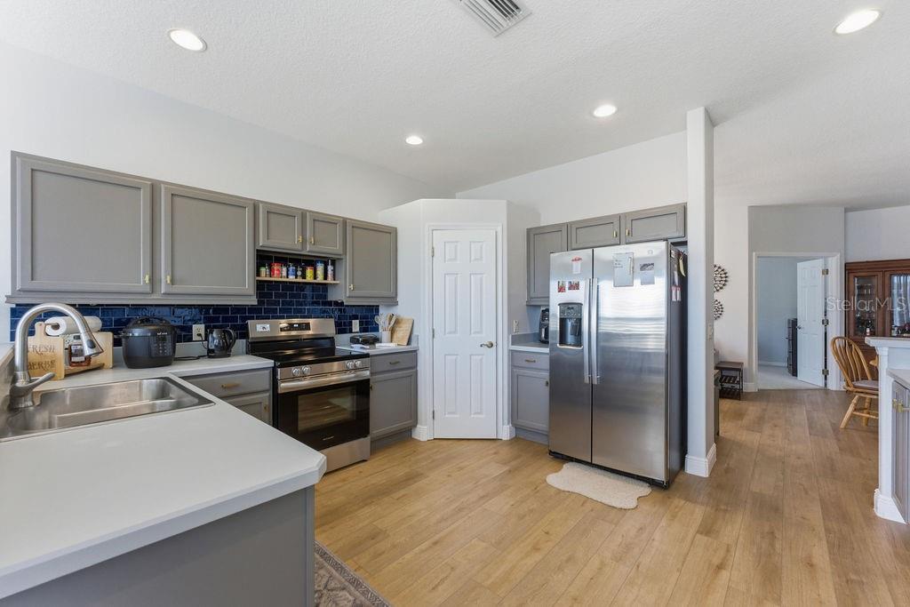 1338 Southwest 161st Place Ocala, FL 34473 - Photo 13 of 88 a kitchen with a refrigerator stove and sink