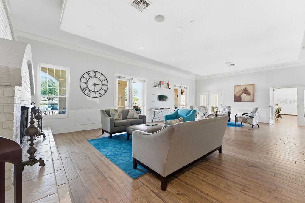 1338 Southwest 161st Place Ocala, FL 34473 - Photo 57 of 88 a living room with furniture and a wooden floor