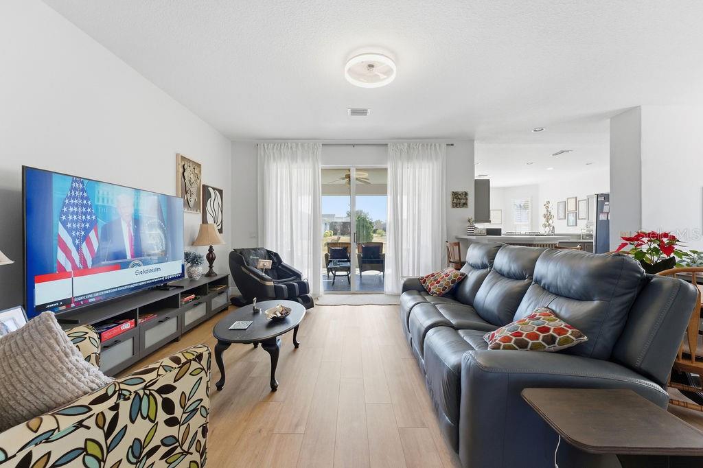 1338 Southwest 161st Place Ocala, FL 34473 - Photo 6 of 88 a living room with furniture and a flat screen tv