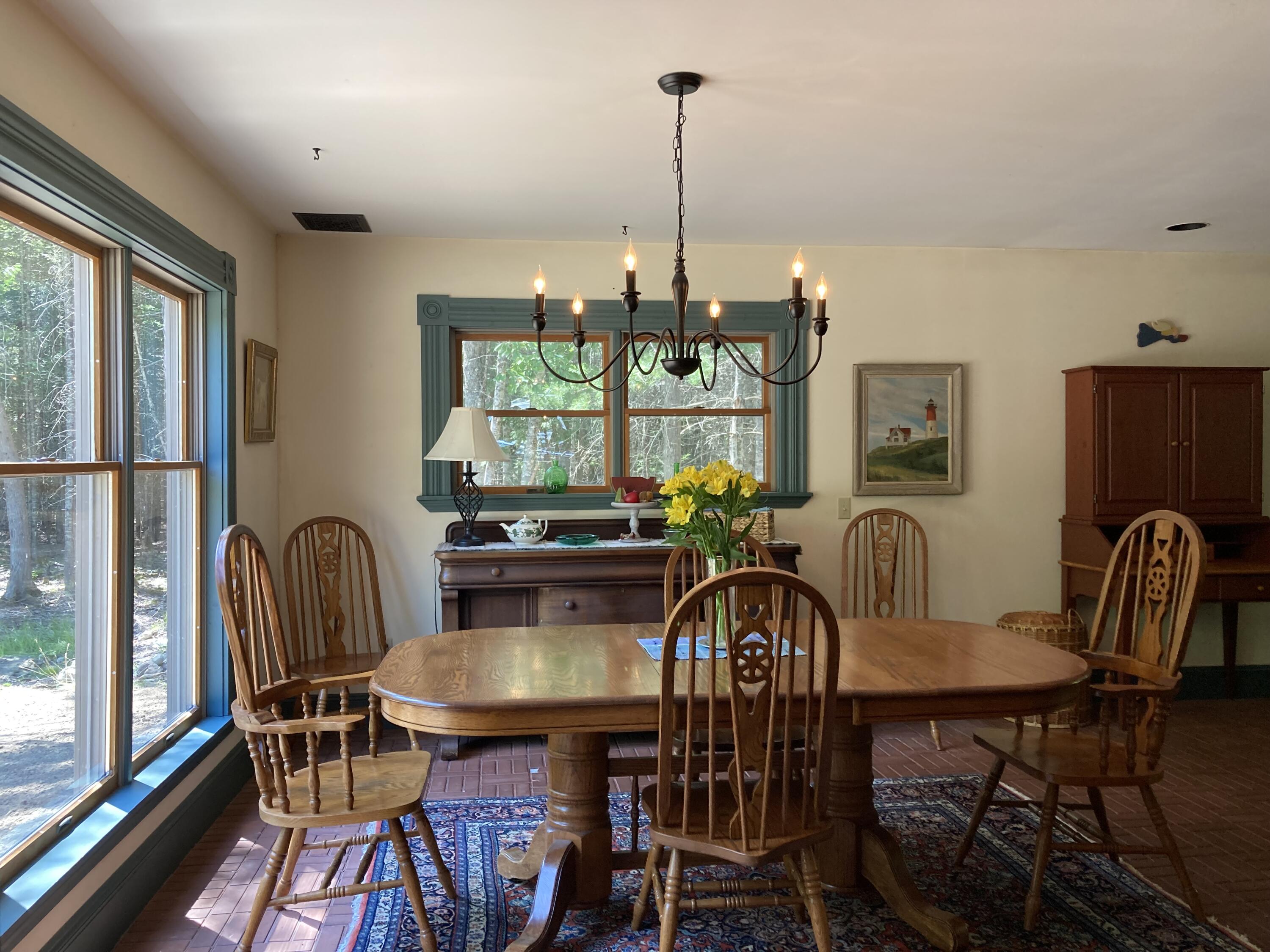 52 Cross Road Hancock, ME 04640 - Photo 11 of 41 View from kitchen into dining room.