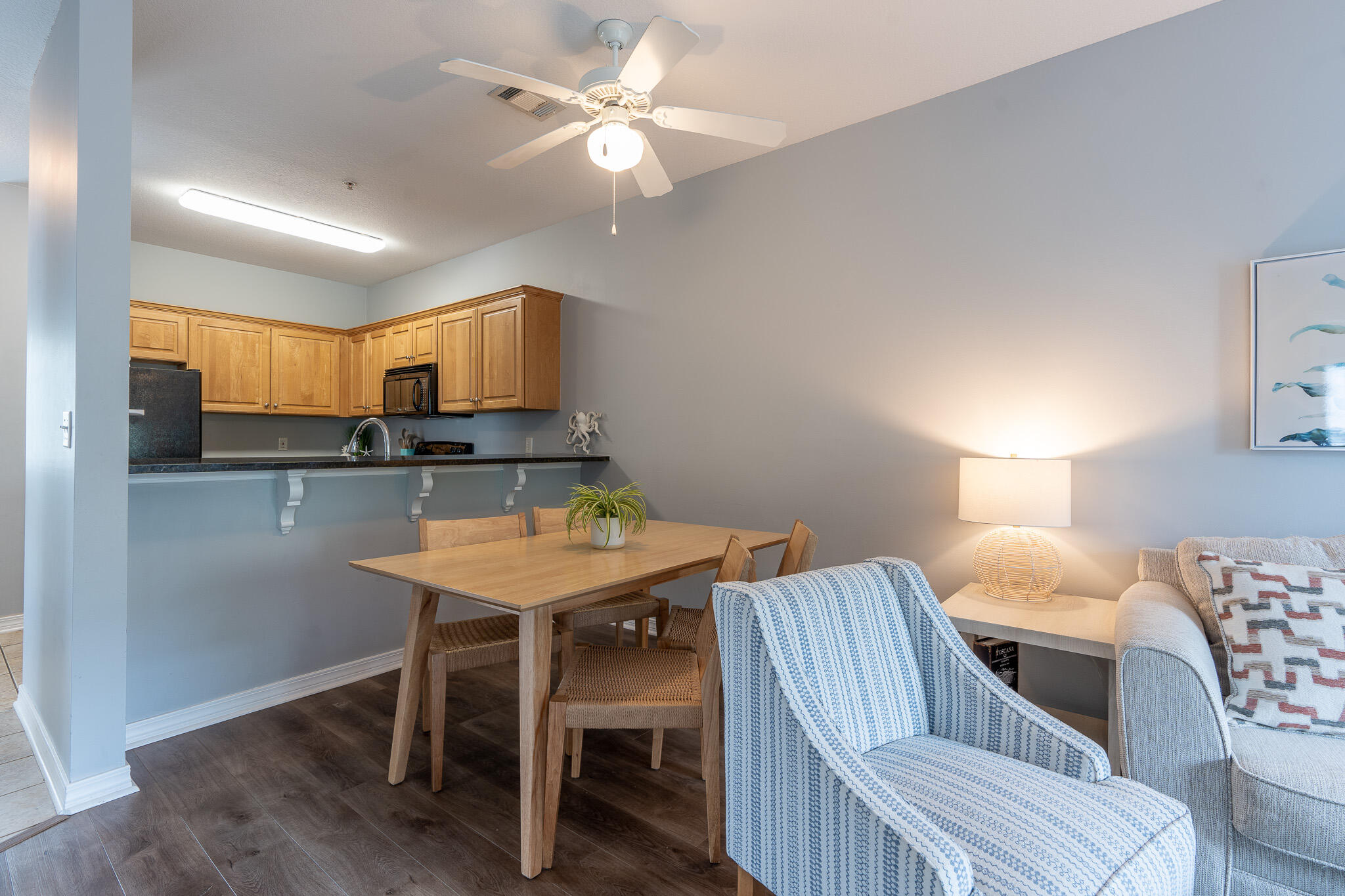 34 Heron's Watch Way, Unit 5205 Santa Rosa Beach, FL 32459 - Photo 12 of 50 a view of kitchen with cabinets and wooden floor
