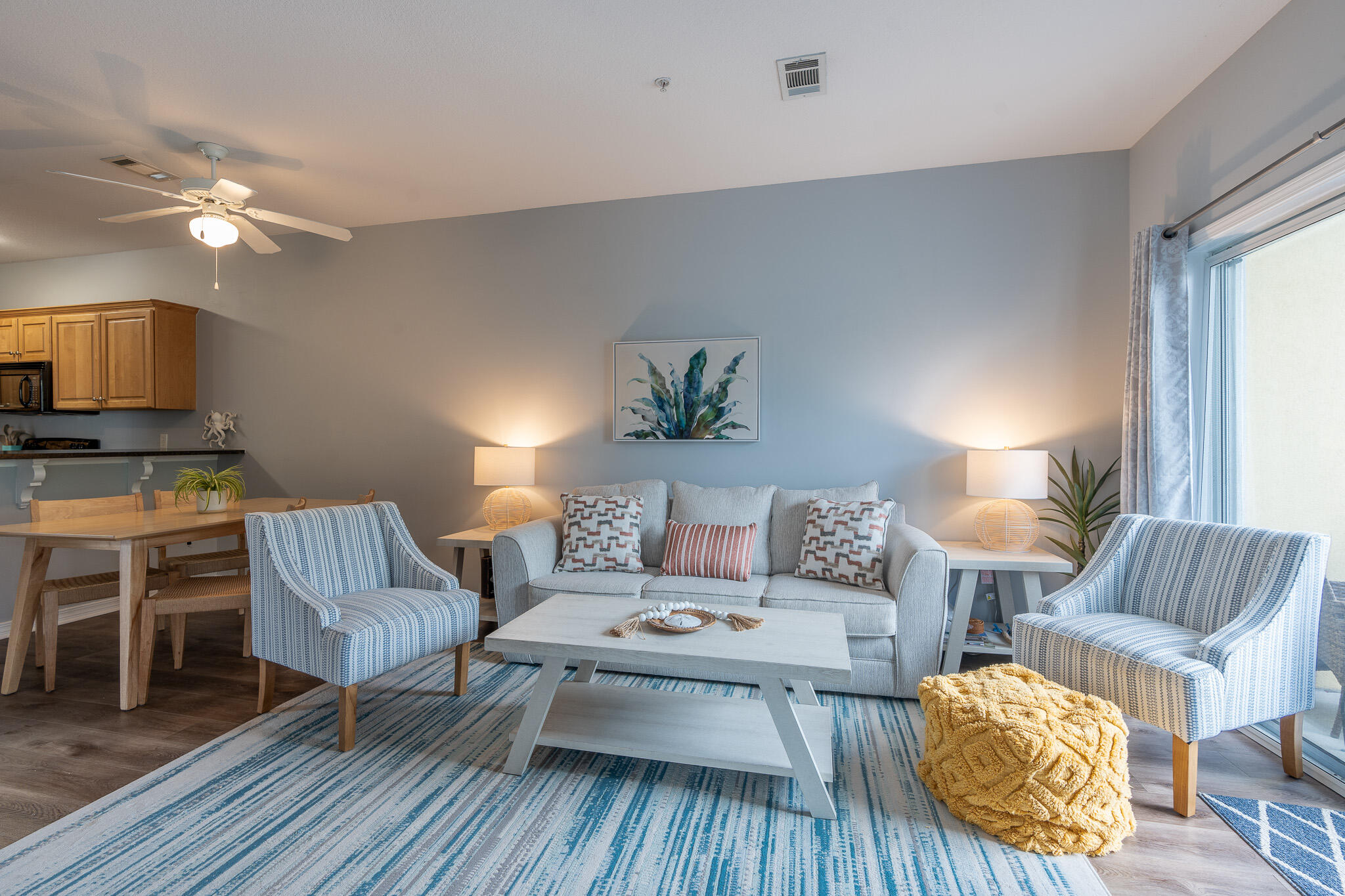 34 Heron's Watch Way, Unit 5205 Santa Rosa Beach, FL 32459 - Photo 14 of 50 a living room with furniture and a wooden floor