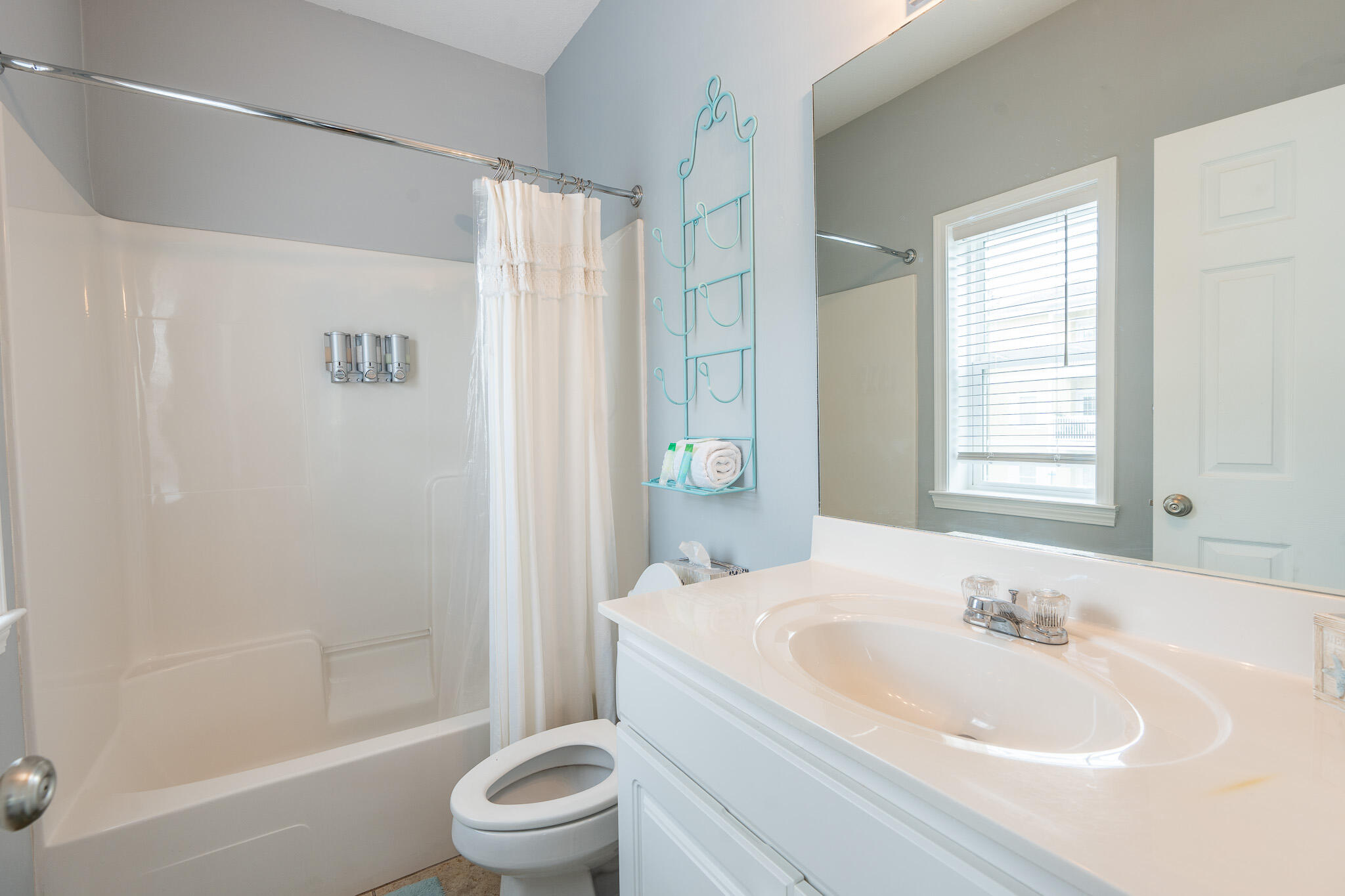 34 Heron's Watch Way, Unit 5205 Santa Rosa Beach, FL 32459 - Photo 21 of 50 a bathroom with a sink a toilet and shower