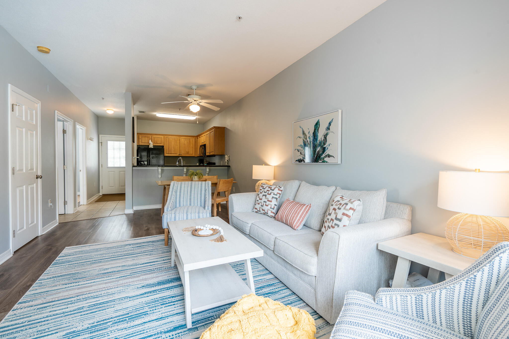 34 Heron's Watch Way, Unit 5205 Santa Rosa Beach, FL 32459 - Photo 26 of 50 a living room with furniture and a table