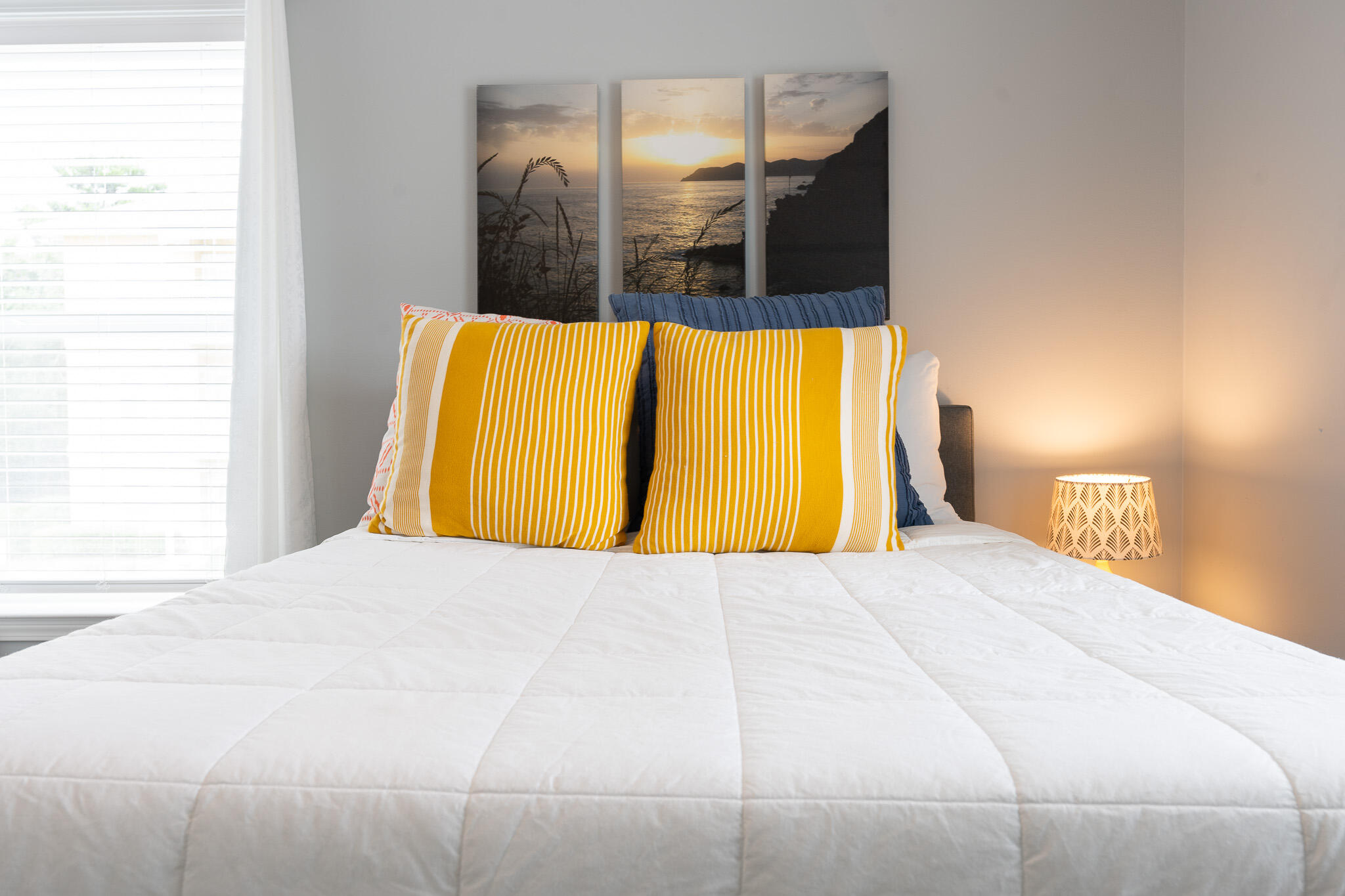 34 Heron's Watch Way, Unit 5205 Santa Rosa Beach, FL 32459 - Photo 31 of 50 a bedroom with a bed and lamp