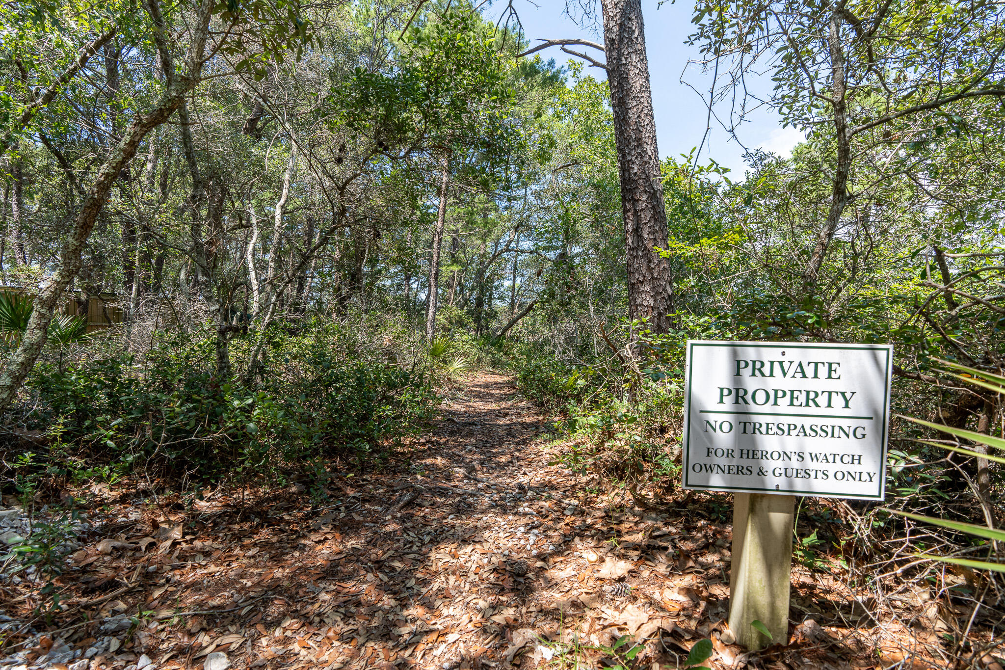 34 Heron's Watch Way, Unit 5205 Santa Rosa Beach, FL 32459 - Photo 43 of 50 a sign on the side of the road