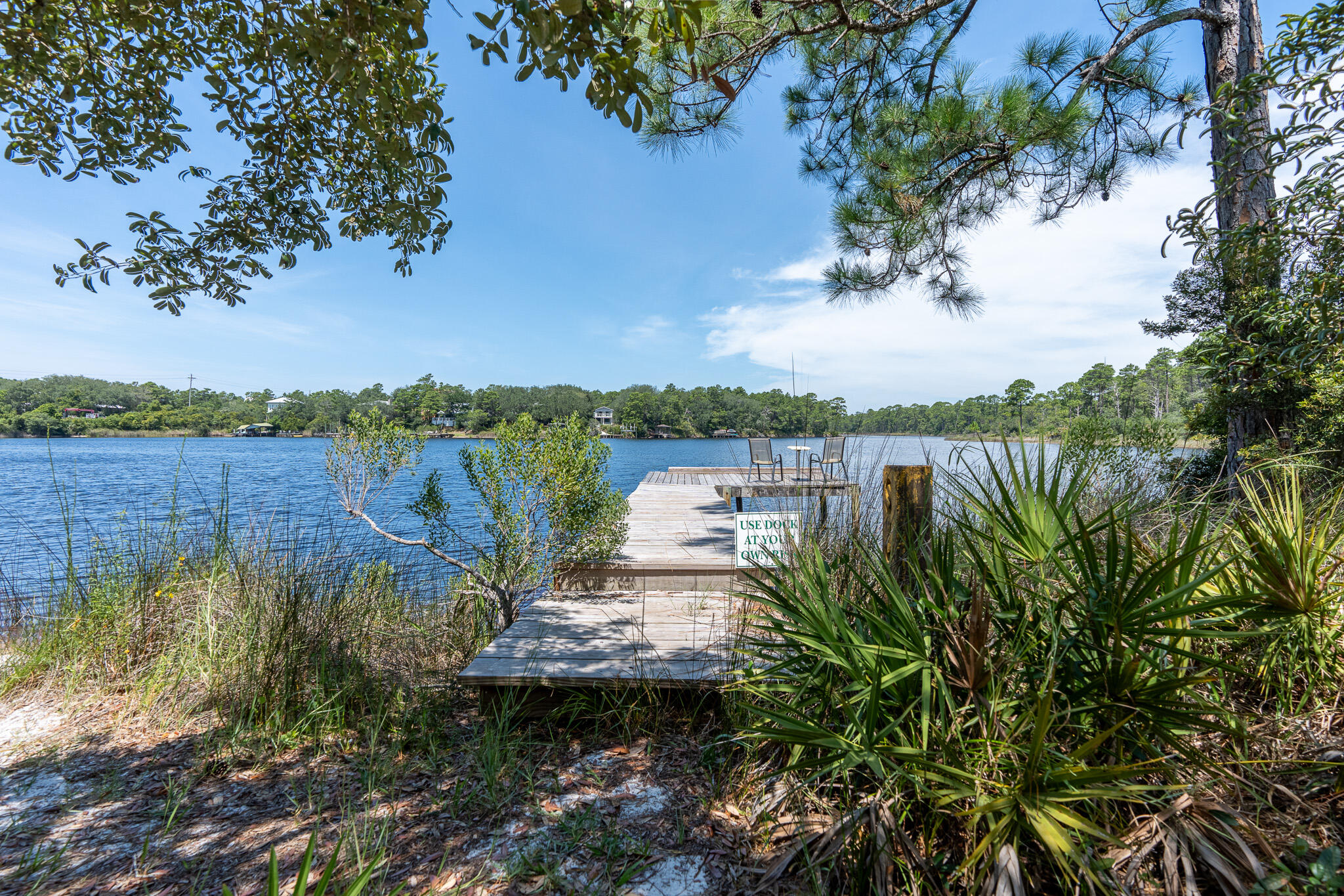 34 Heron's Watch Way, Unit 5205 Santa Rosa Beach, FL 32459 - Photo 45 of 50 a view of a lake with houses in the back