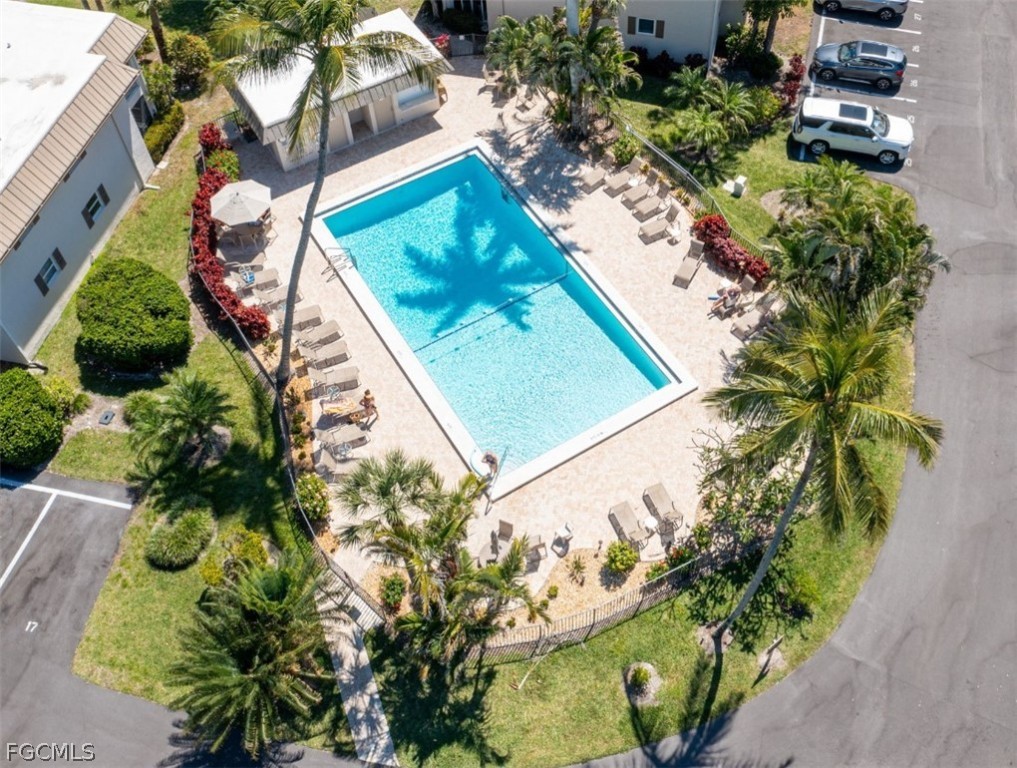 1549 Sandpiper Street, Unit 34 Naples, FL 34102 - Photo 14 of 15 an aerial view of a garden