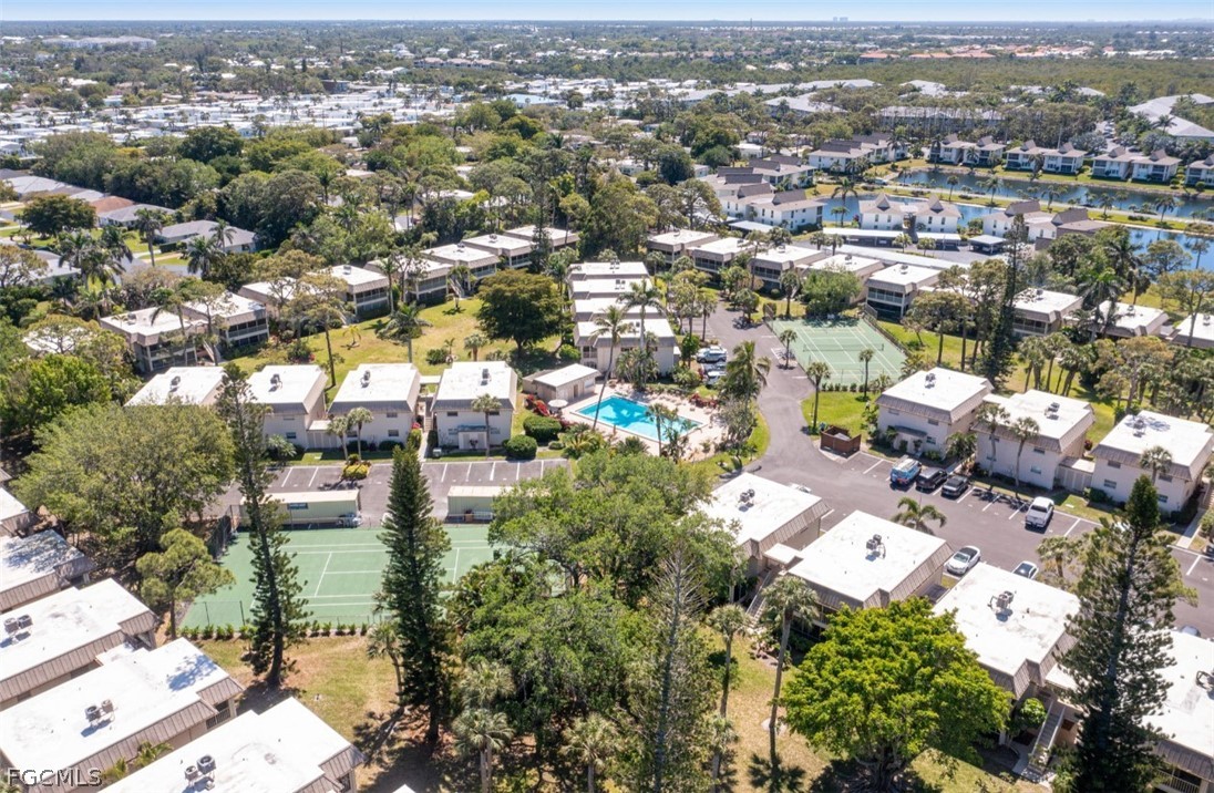 1549 Sandpiper Street, Unit 34 Naples, FL 34102 - Photo 15 of 15 an aerial view of a city with lots of residential buildings
