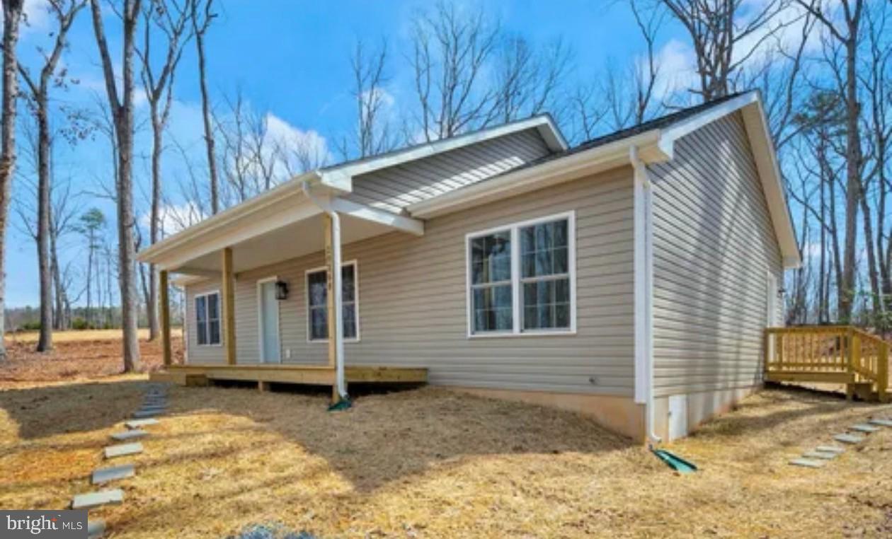 13672 Spring Street Unionville, VA 22567 - Photo 1 of 2 a view of a house with a yard