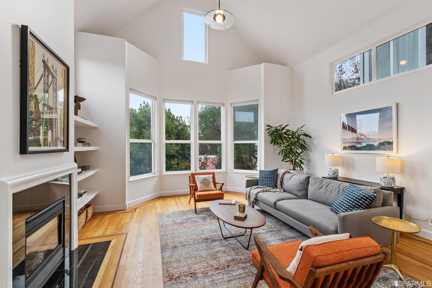 8 Joy Street San Francisco, CA 94110 - Photo 2 of 42 a living room with furniture and a large window