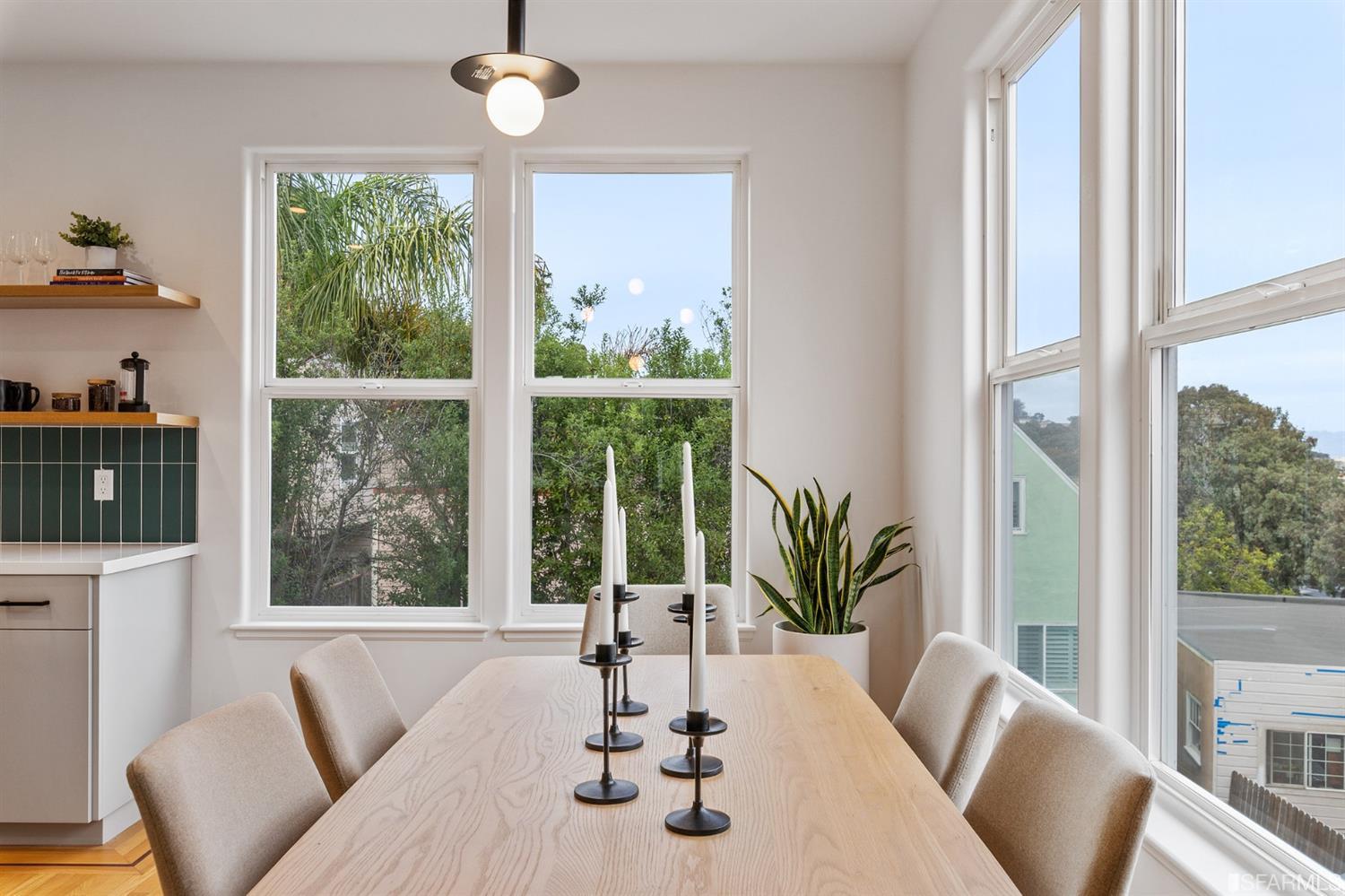 8 Joy Street San Francisco, CA 94110 - Photo 11 of 42 a living room with furniture and a large window