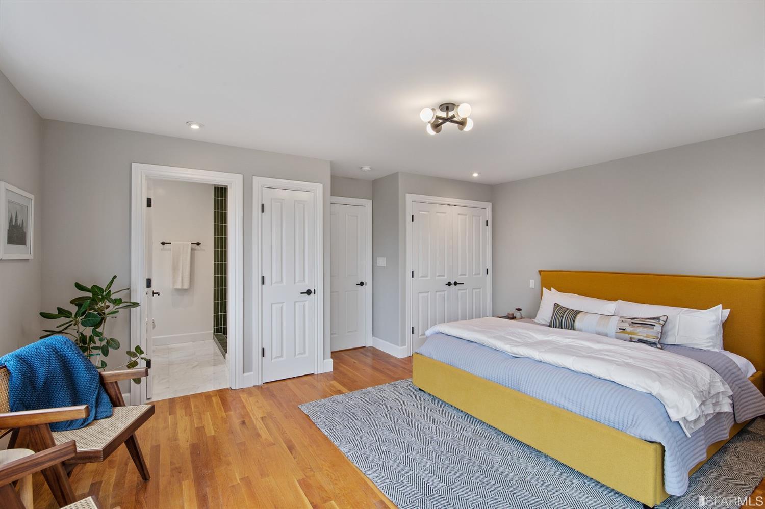 8 Joy Street San Francisco, CA 94110 - Photo 26 of 42 a bedroom with a bed and a table