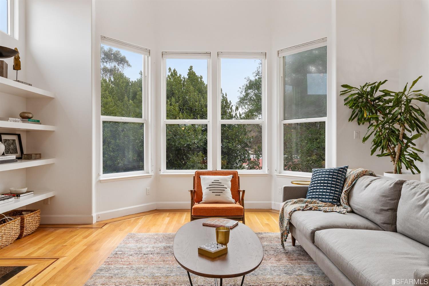8 Joy Street San Francisco, CA 94110 - Photo 4 of 42 a living room with furniture and a large window