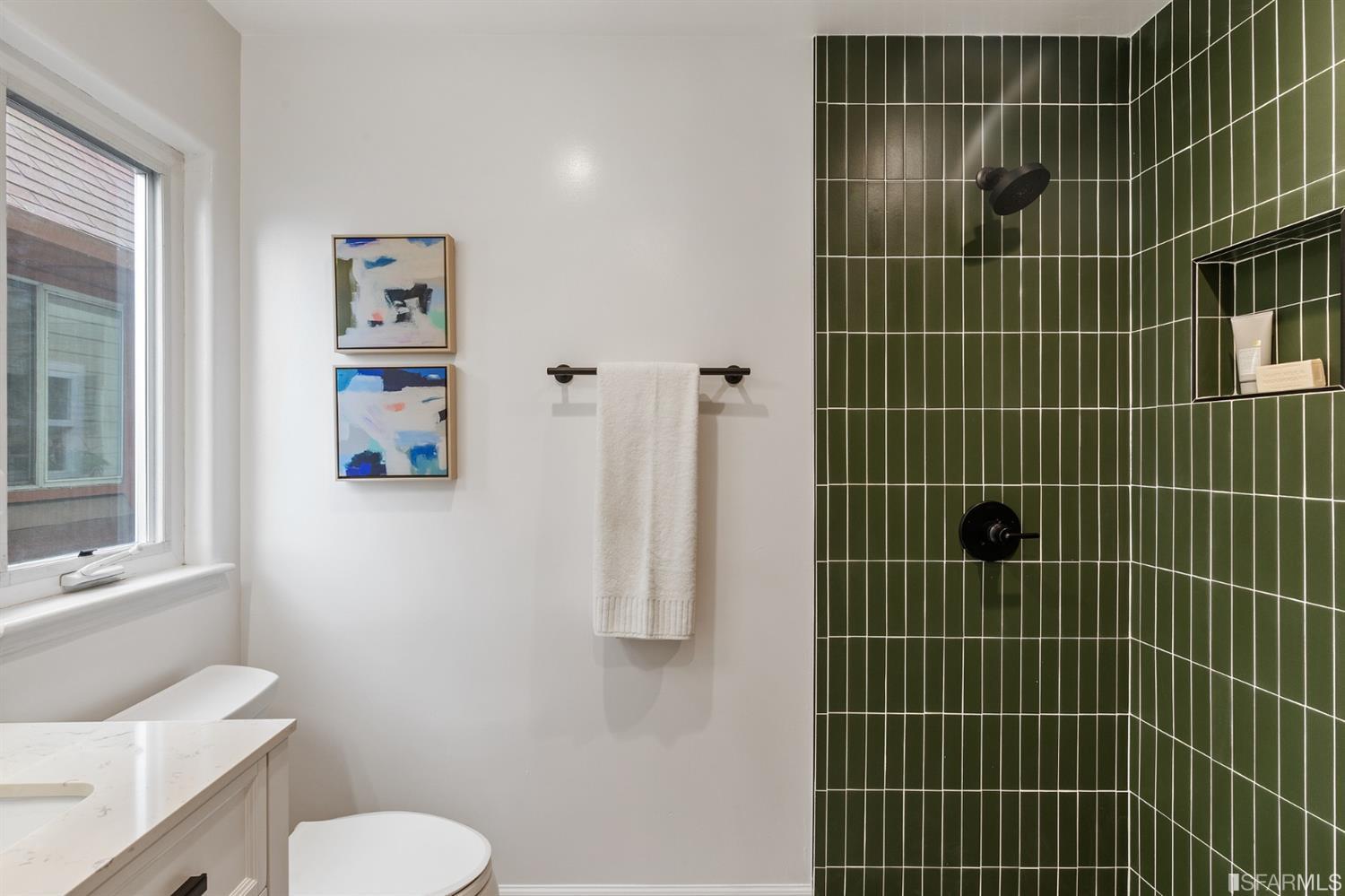 8 Joy Street San Francisco, CA 94110 - Photo 33 of 42 a bathroom with a toilet sink and shower