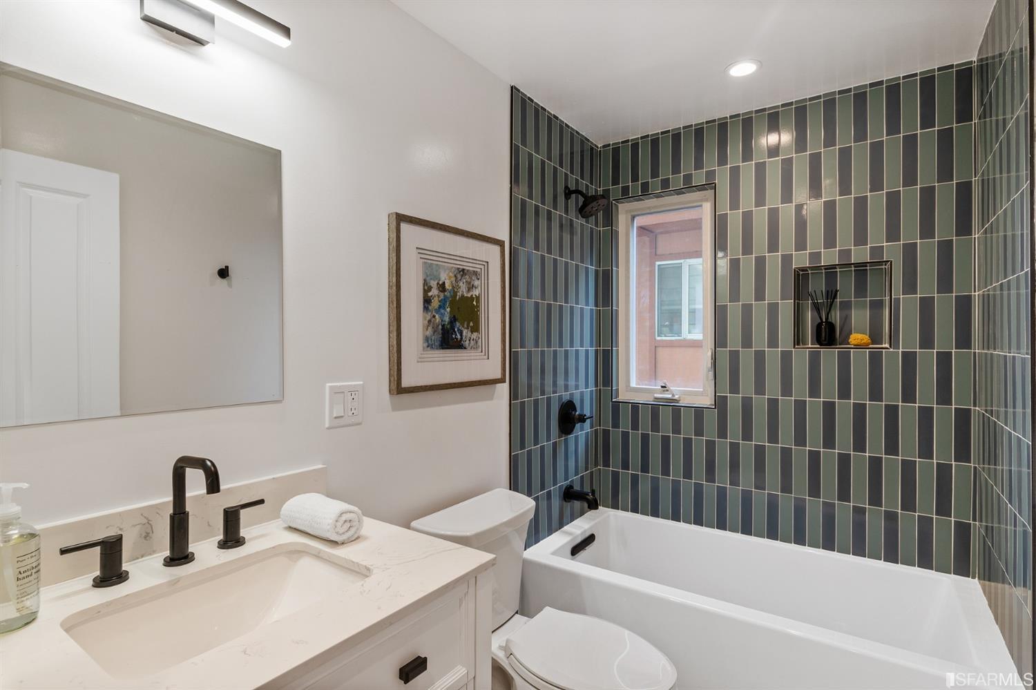 8 Joy Street San Francisco, CA 94110 - Photo 36 of 42 a bathroom with a bathtub shower sink and toilet