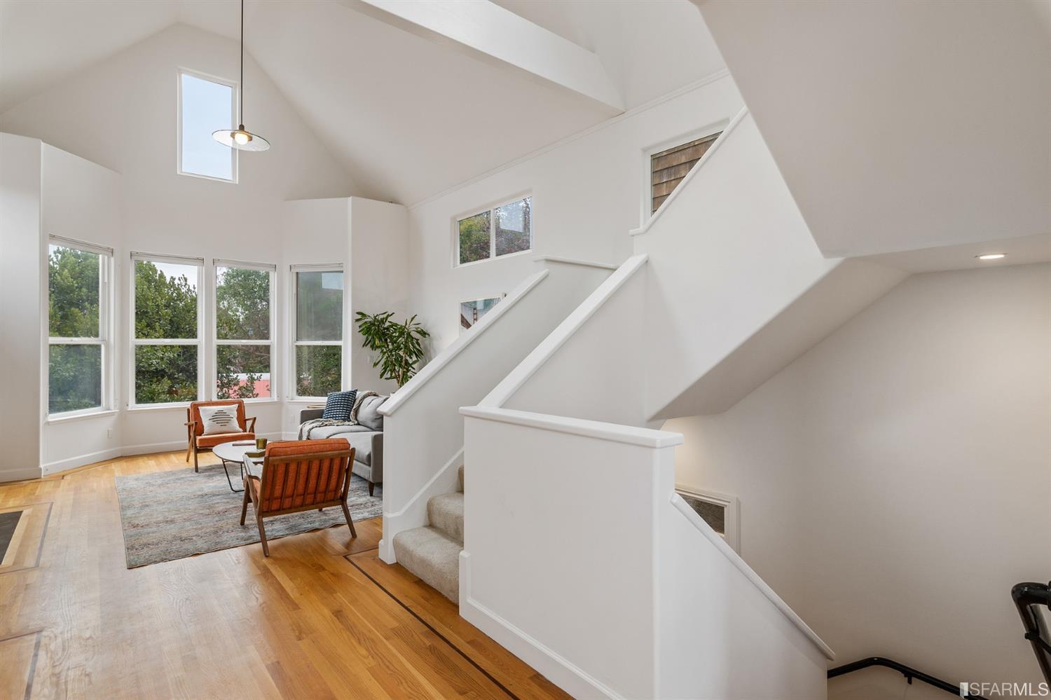 8 Joy Street San Francisco, CA 94110 - Photo 6 of 42 a living room with furniture and a large window