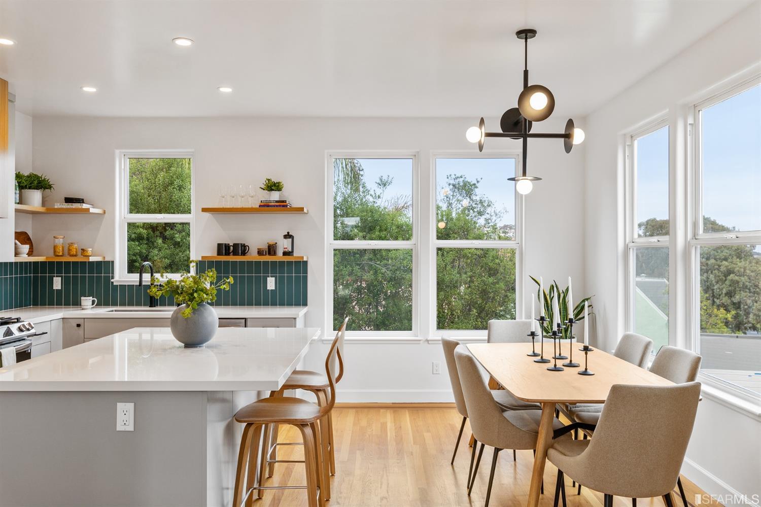 8 Joy Street San Francisco, CA 94110 - Photo 10 of 42 a kitchen with a table chairs and window