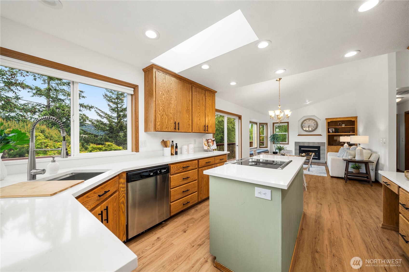 183 Dow Ridge Drive North Eatonville, WA 98328 - Photo 11 of 40 a kitchen with stainless steel appliances granite countertop sink stove and refrigerator