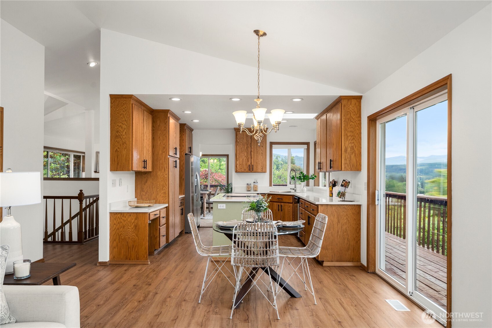 183 Dow Ridge Drive North Eatonville, WA 98328 - Photo 17 of 40 a view of a dining room with furniture window and wooden floor